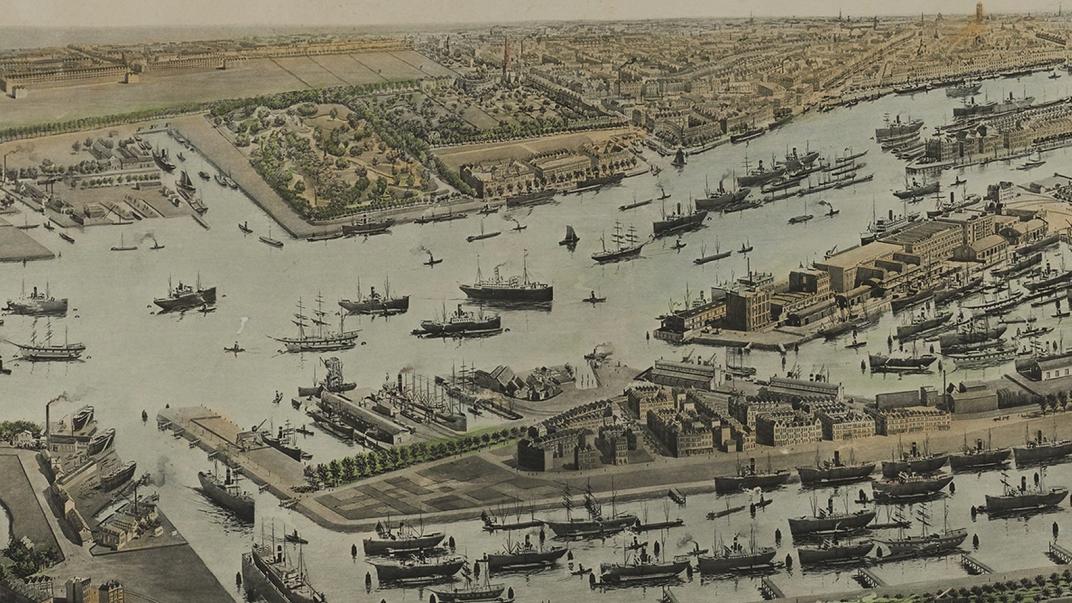 Gezicht op Rotterdam in vogelvlucht met het zuidelijk stadsdeel op de voorgrond.